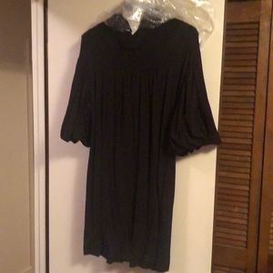 Black tunic style dress.  Cowl neck   Short
